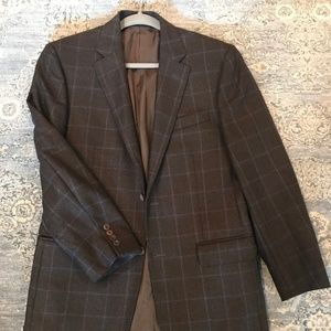 Brown sports coat with light blue check